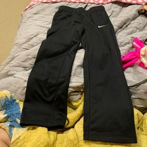 Black Nike Dri-fit kids sweatpants. Size: M
